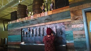 The wall of beer taps at Hi-wire brewery