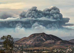 The thomas fire raises above southern california mountains.