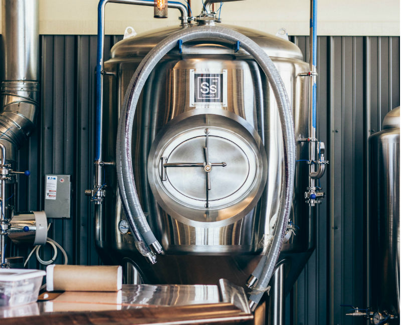 A stainless steel homebrew kettle.