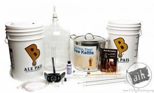 A collection of homebrewing equipment including a steel kettle and carboys.