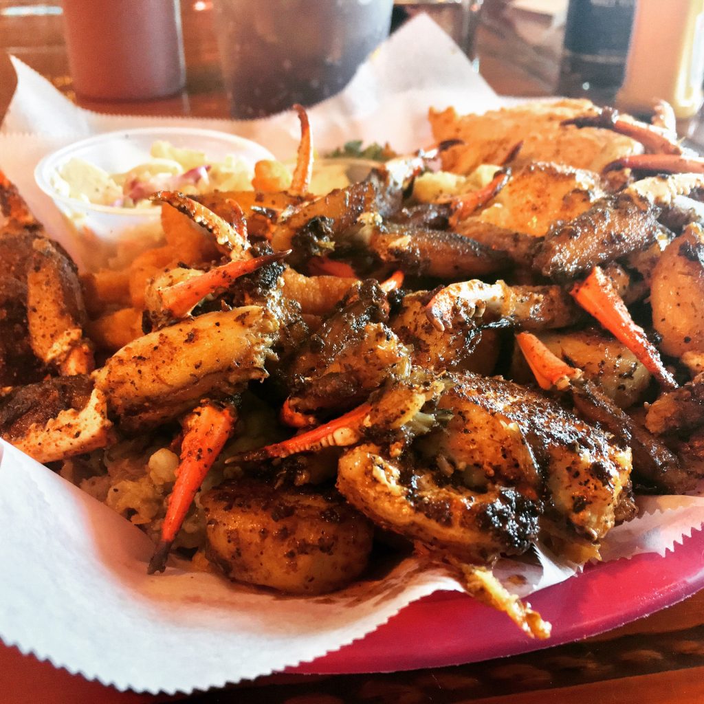 A plate piled high with seafood choices at Dusty's Oyster bar
