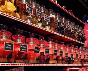 The wall of infused vodkas in jars at The Russian House in Austin