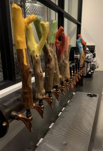 Colorful natural tap handles at Ficklewood Ciderworks
