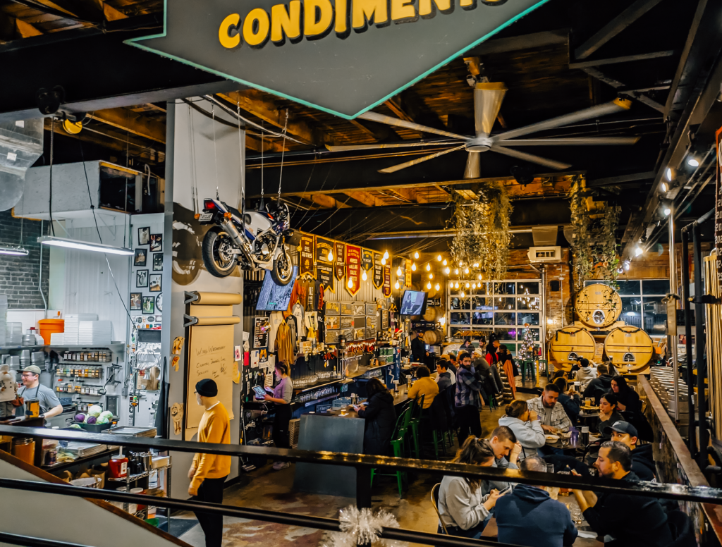 Overlooking main dining room with people.